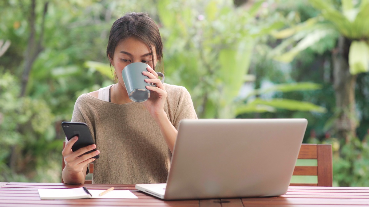 Freelance Asian Woman Working At Home, Business Female Working O